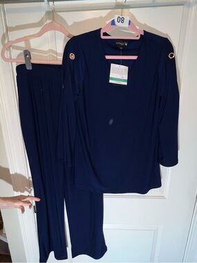 Antthony Women's 2-piece Rhinestone Grommet Pant Set. NWT. Size: L. Asking: $50.